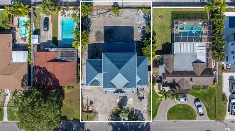 an aerial view of houses and roads