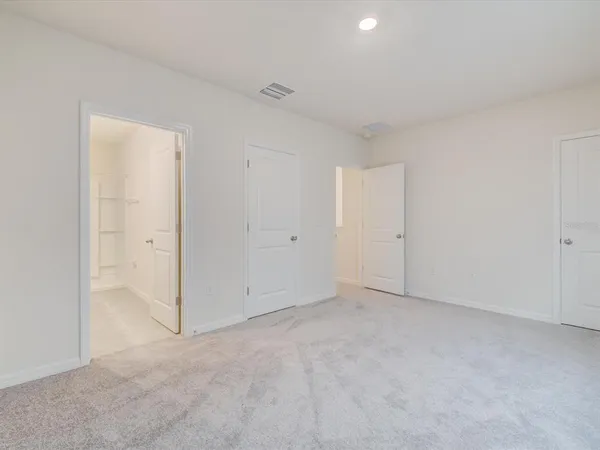 an empty room with an entryway