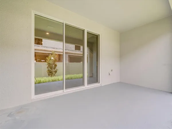 a view of a back yard of the building