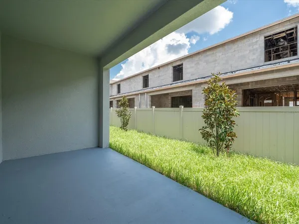 a view of a swimming pool with a garden