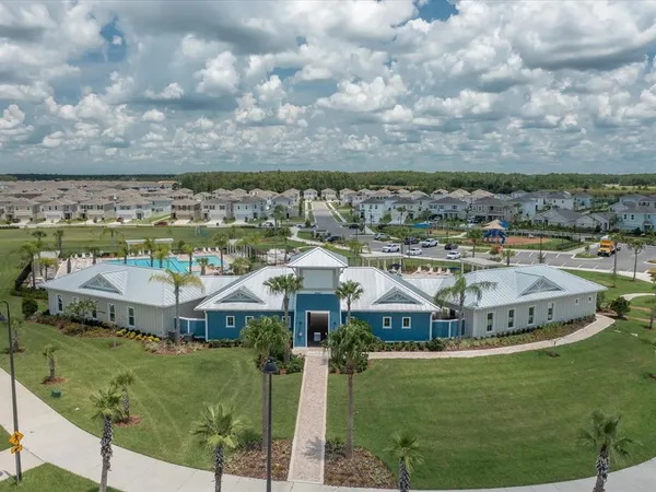 a view of a city with lawn chairs