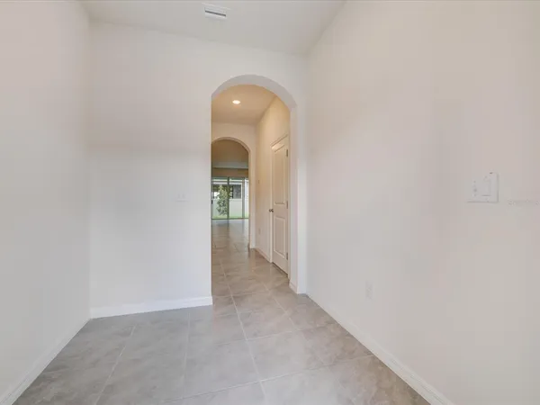 a view of a room with an entryway