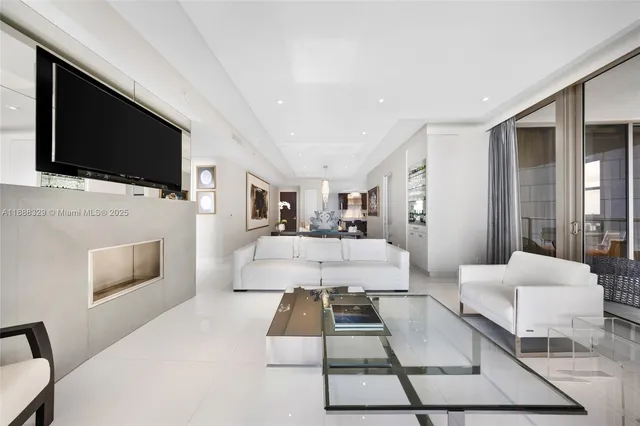 a kitchen with a sink stainless steel appliances and counter space