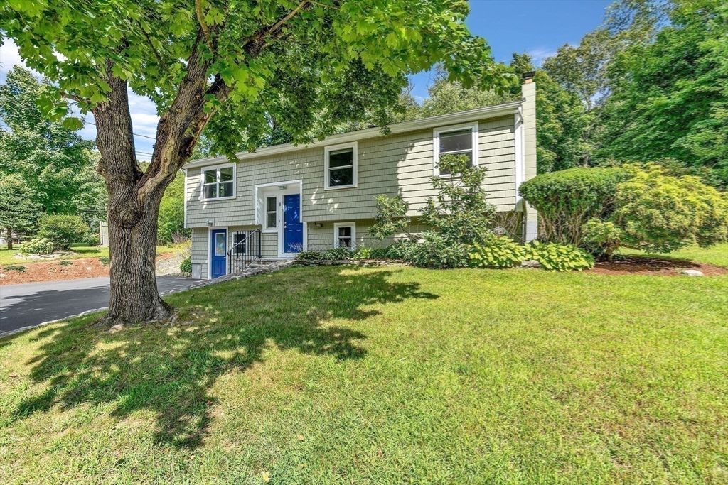 5 Robin Circle Westborough, MA 01581 - Photo 27 of 29 a house view with a garden space