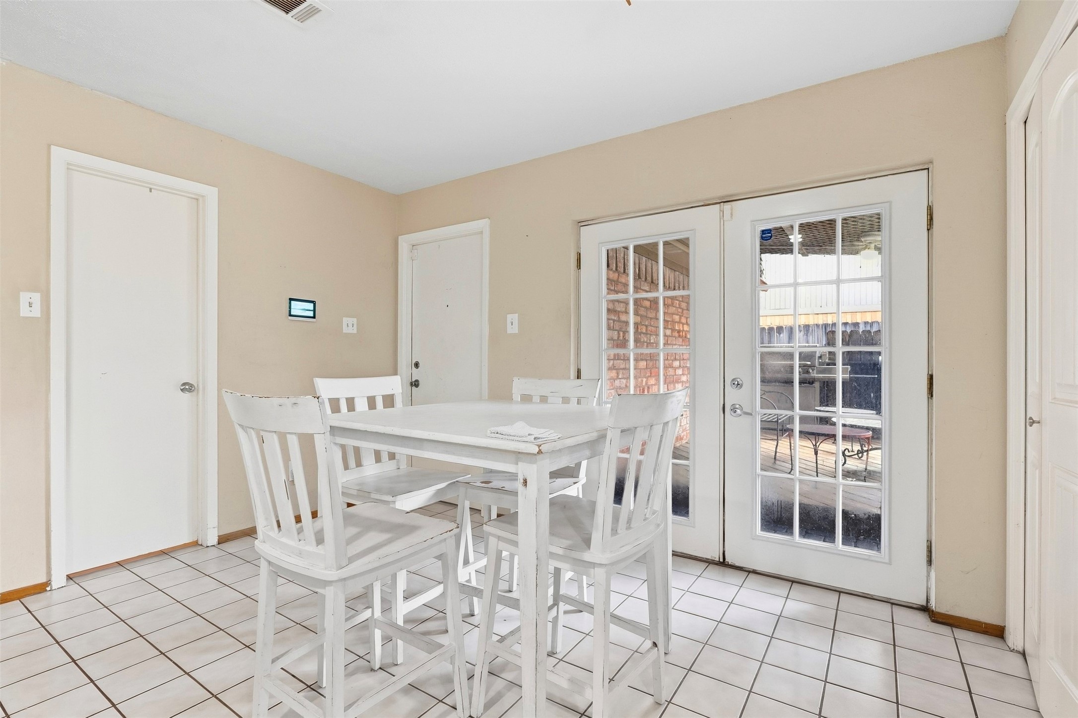 25539 Chapel Ridge Lane Spring, TX 77373 - Photo 11 of 40 Bright dining area with French doors leading to an outdoor space.