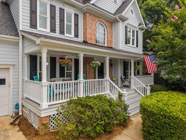 front view of a house with a small yard