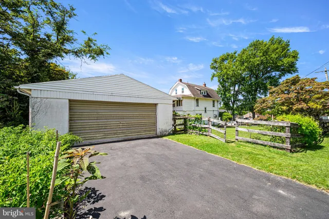 a front view of a house with swimming pool