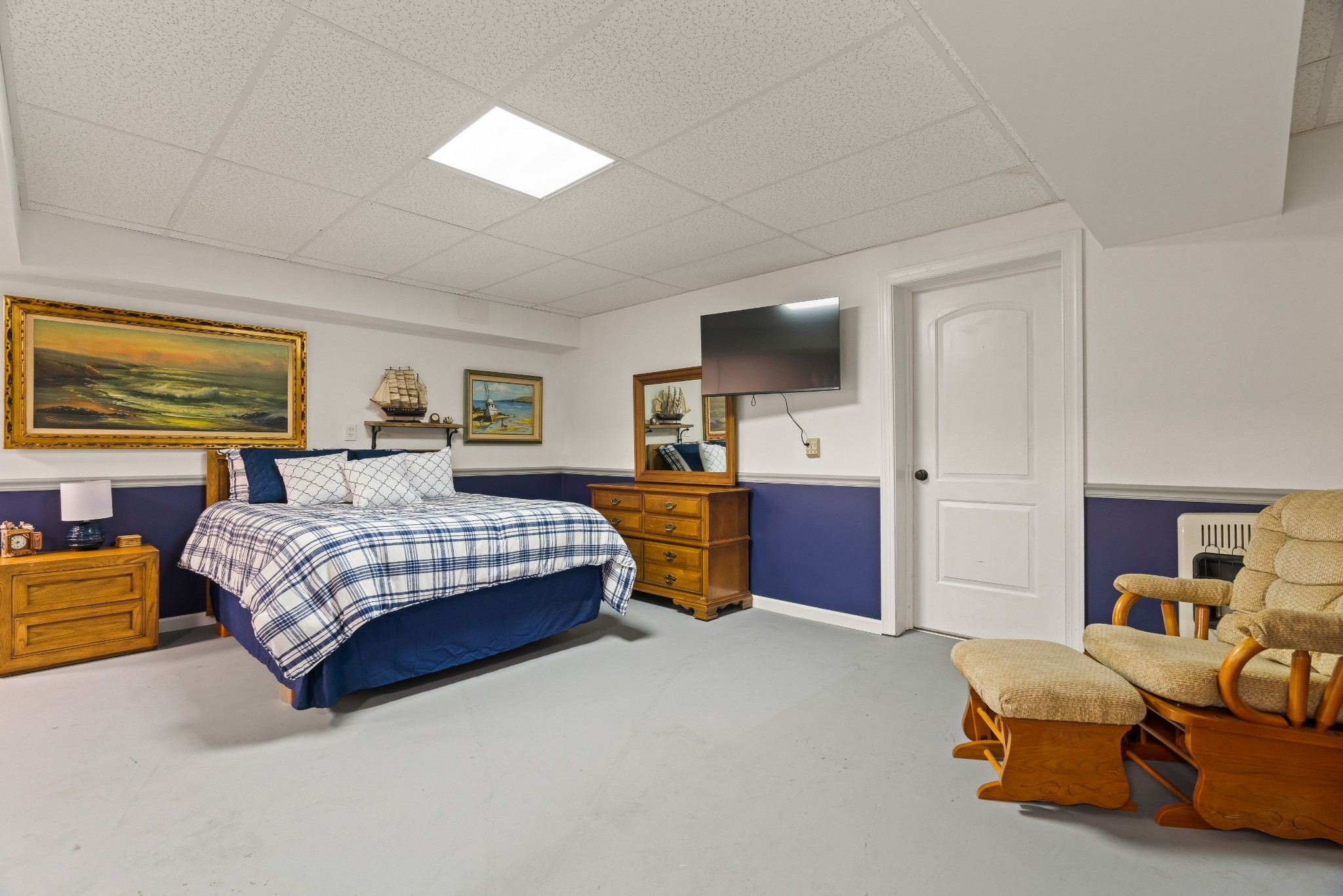 725 Fowler Ford Road Portland, TN 37148 - Photo 30 of 66 a bedroom with a bed and a flat screen tv