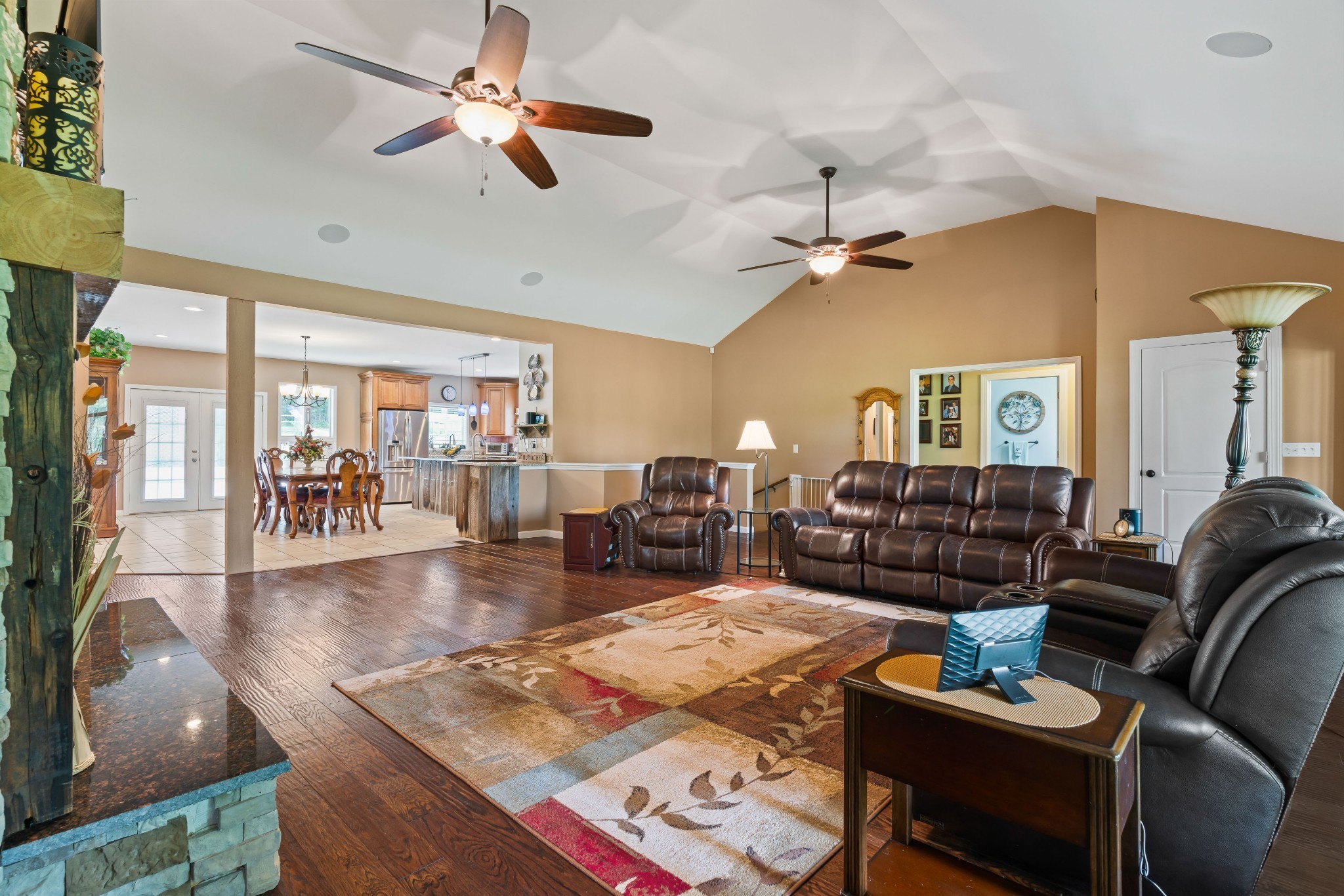 725 Fowler Ford Road Portland, TN 37148 - Photo 10 of 66 a living room with furniture and a chandelier