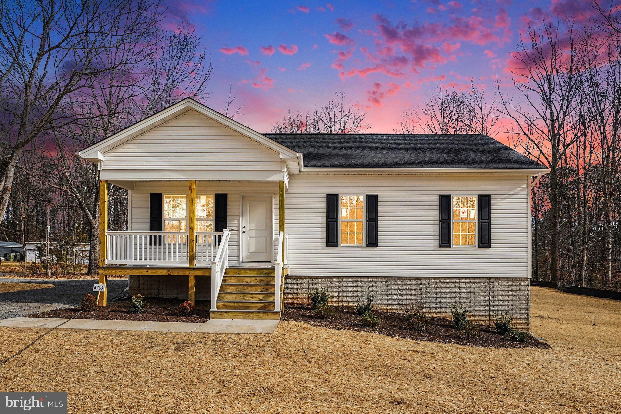6285 Waterford Road Rixeyville, VA 22737 - Photo 1 of 36 a front view of a house with a yard