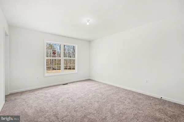 an empty room with an entryway