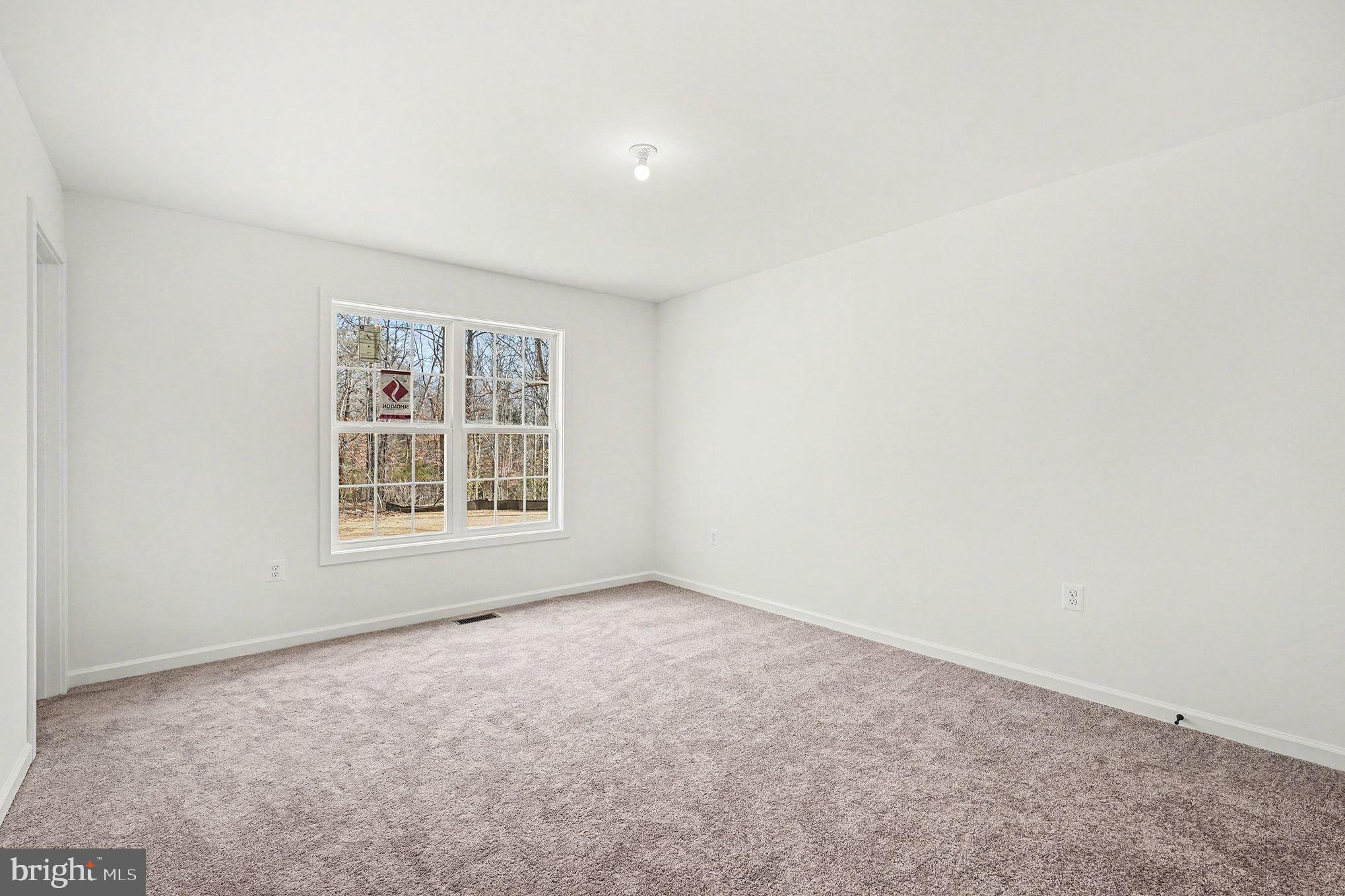 6285 Waterford Road Rixeyville, VA 22737 - Photo 23 of 36 an empty room with a window