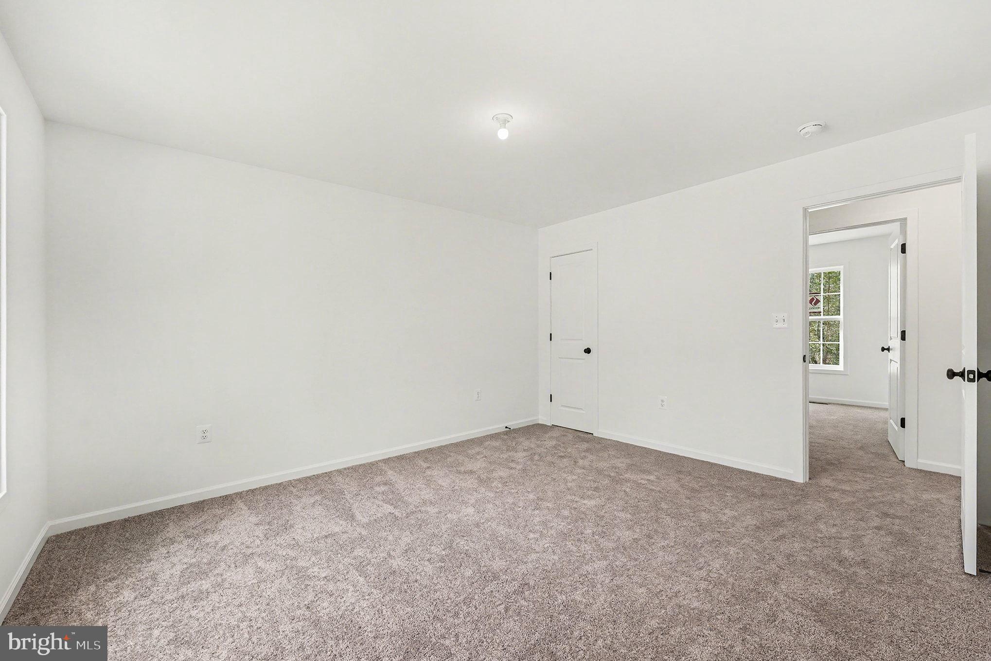 6285 Waterford Road Rixeyville, VA 22737 - Photo 24 of 36 an empty room with an entryway
