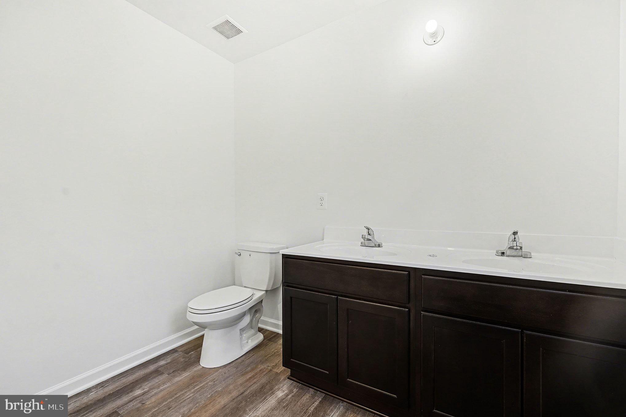 6285 Waterford Road Rixeyville, VA 22737 - Photo 27 of 36 a view of bathroom with a sink and a toilet