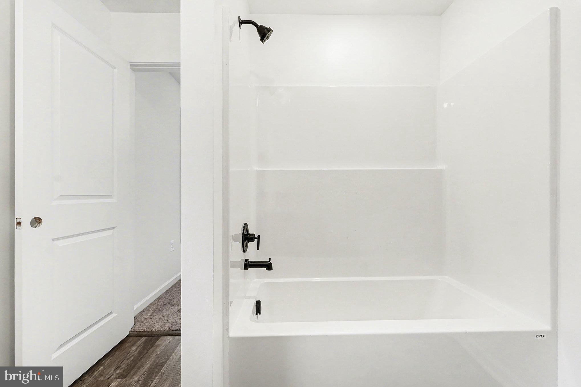 6285 Waterford Road Rixeyville, VA 22737 - Photo 28 of 36 a bathroom with a bathtub