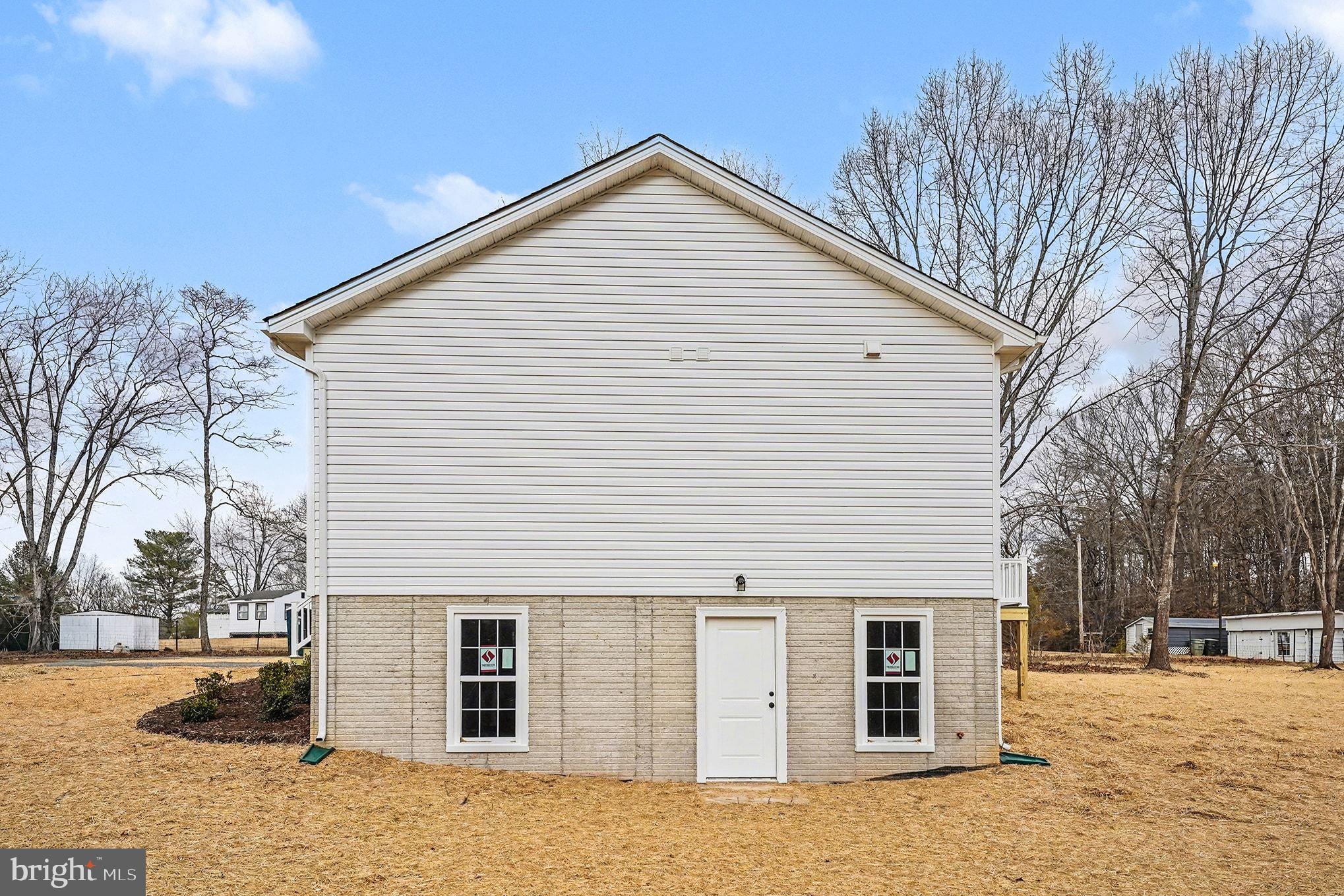 6285 Waterford Road Rixeyville, VA 22737 - Photo 36 of 36 a view of a house with a yard
