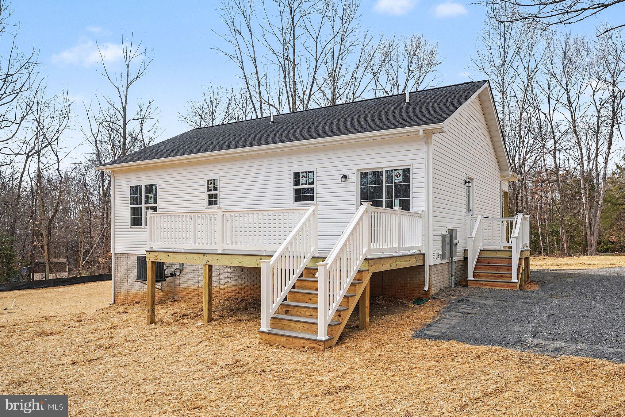 6285 Waterford Road Rixeyville, VA 22737 - Photo 8 of 36 a view of a house with a yard and roof deck