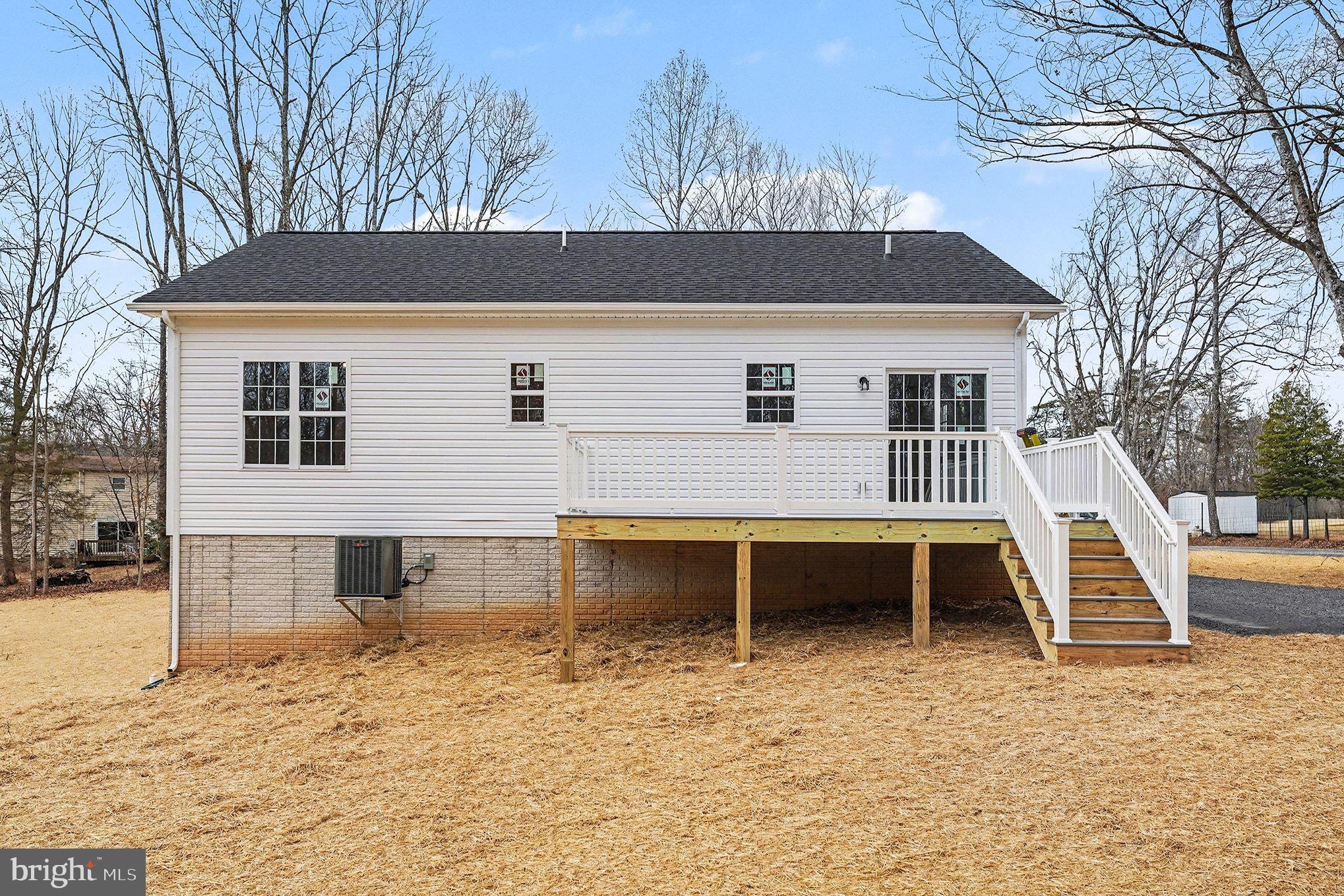 6285 Waterford Road Rixeyville, VA 22737 - Photo 9 of 36 a view of a house with a wooden fence