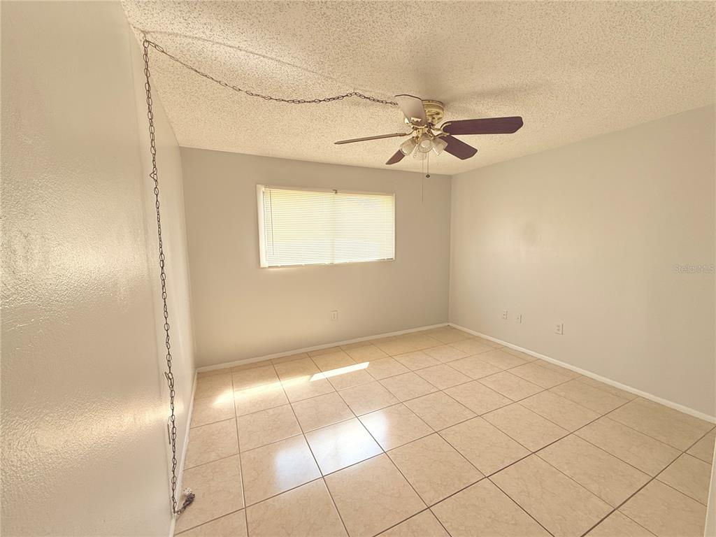 910 Lake Destiny Road, Unit E Altamonte Springs, FL 32714 - Photo 11 of 29 a view of an empty room with a window