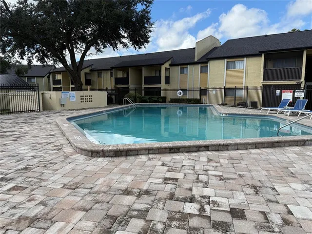 a view of a room with windows