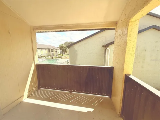 a view of a room with windows