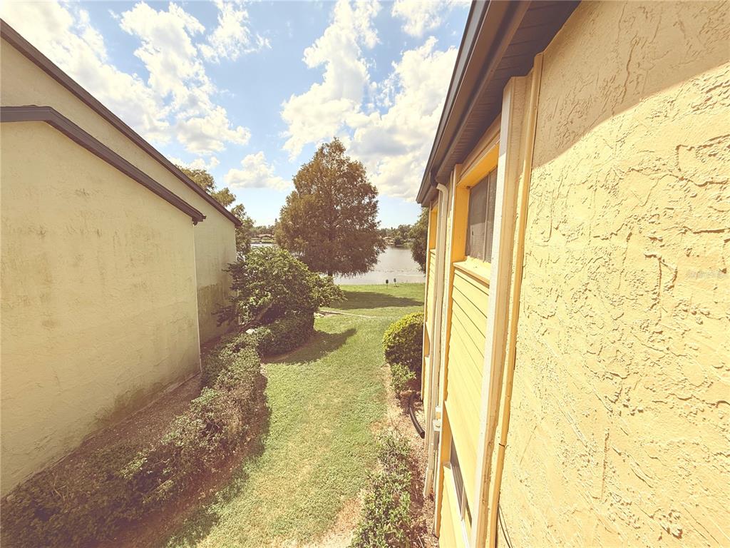 910 Lake Destiny Road, Unit E Altamonte Springs, FL 32714 - Photo 18 of 29 a view of a back yard of the building