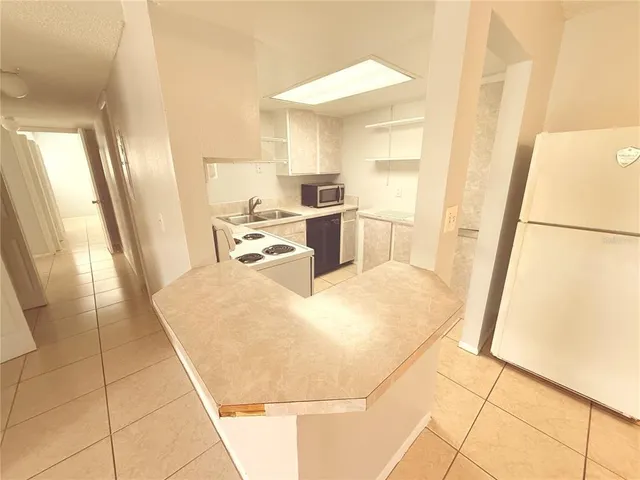 a bed room with a bed and a mirror