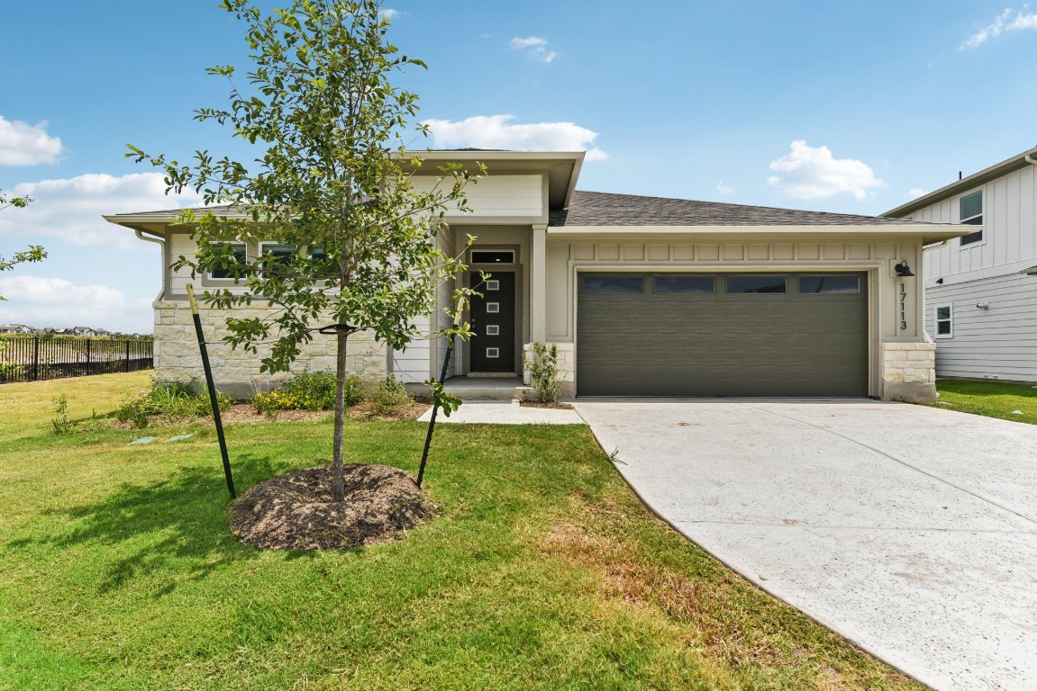 a house view with a garden space