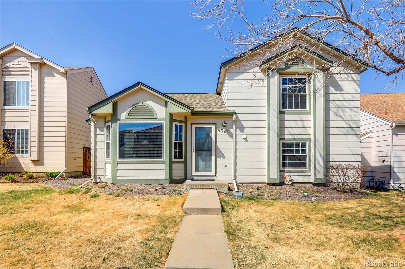 4381 Perth Circle Denver, CO 80249 - Photo 27 of 35 a front view of a house