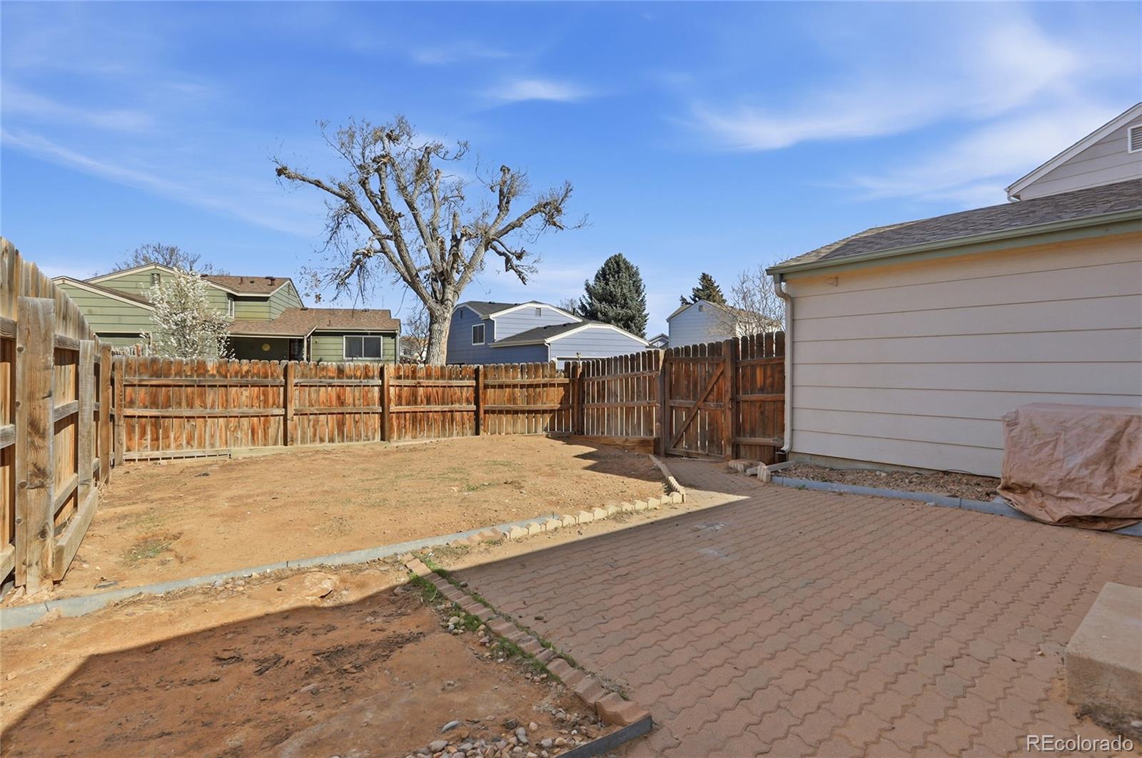 4381 Perth Circle Denver, CO 80249 - Photo 30 of 35 a view of a backyard of the house