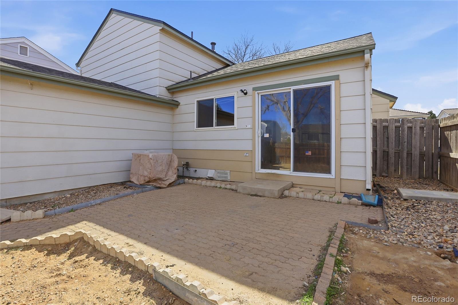 4381 Perth Circle Denver, CO 80249 - Photo 31 of 35 a front view of a house