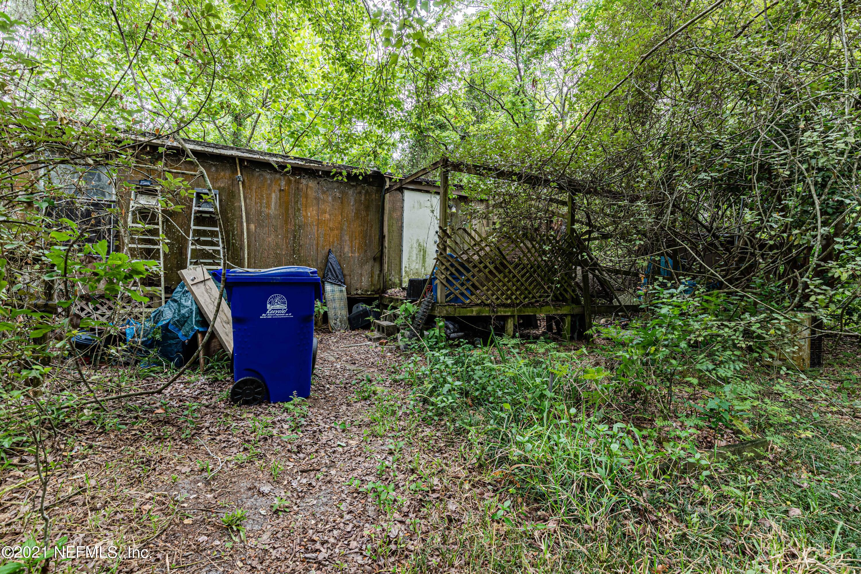 1490 Marlee Road St. Johns, FL 32259 - Photo 4 of 11 a view of a couches in backyard of house
