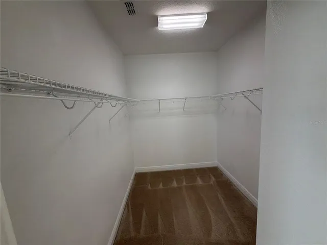 a view of a room with racks on the wall