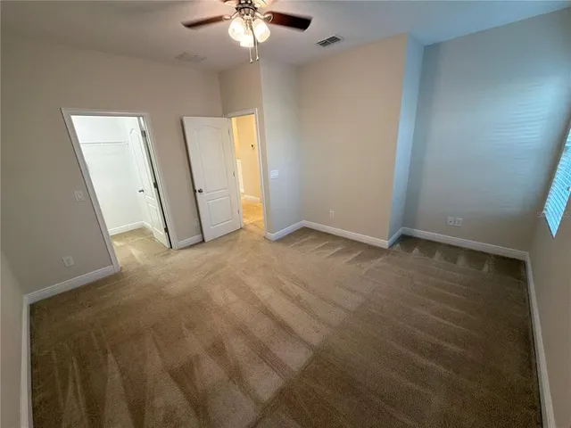 a bathroom with 2 sink and a mirror