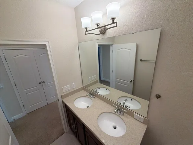 a bathroom with a white bath tub