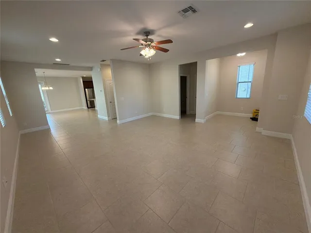 a view of a livingroom with a ceiling fan