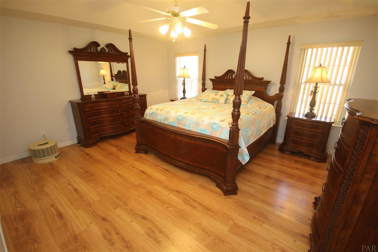 5337 Morgan Ridge Drive Milton, FL 32570 - Photo 20 of 50 beautiful Laminate flooring with the look of wood.