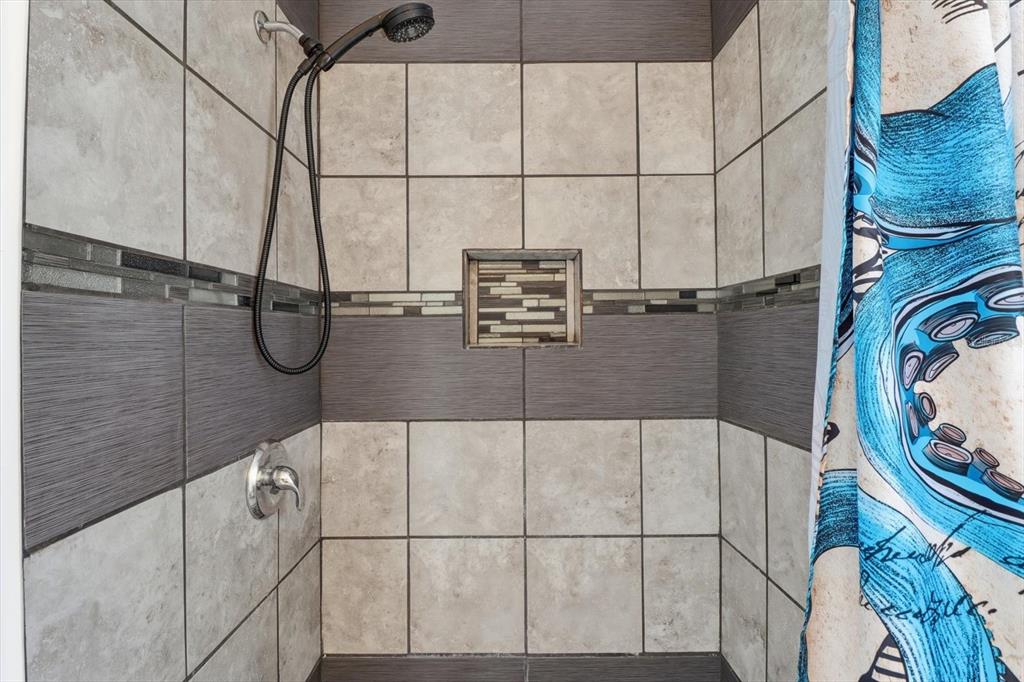 1050 North Midiron Point Crystal River, FL 34429 - Photo 28 of 57 a bathroom with a bathtub and shower