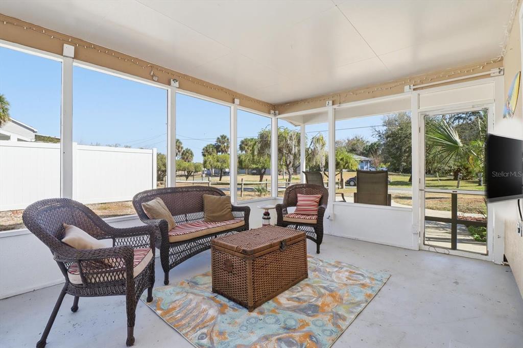 1050 North Midiron Point Crystal River, FL 34429 - Photo 32 of 57 a living room with furniture and large windows