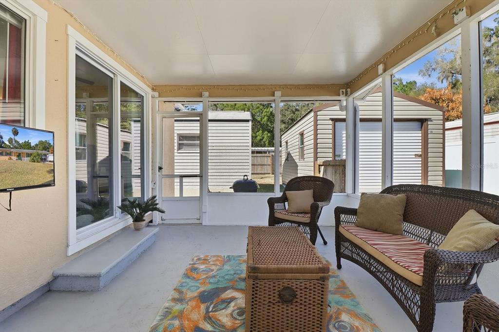 1050 North Midiron Point Crystal River, FL 34429 - Photo 33 of 57 a living room with furniture and a large window