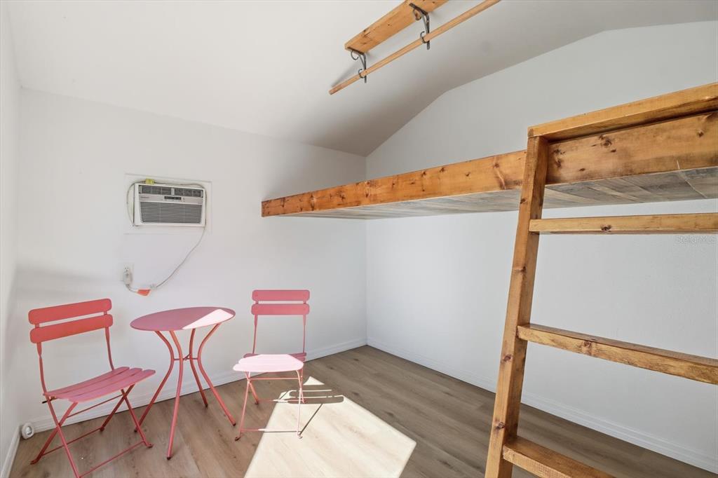 1050 North Midiron Point Crystal River, FL 34429 - Photo 36 of 57 a view of a room with furniture and wooden floor