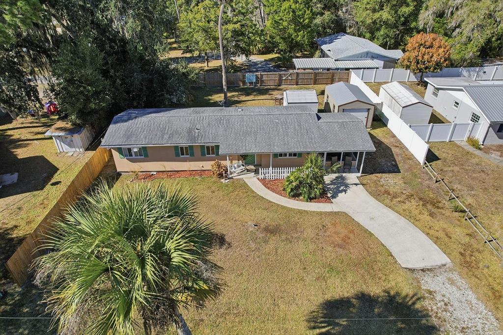 1050 North Midiron Point Crystal River, FL 34429 - Photo 42 of 57 a view of a house with pool and sitting area