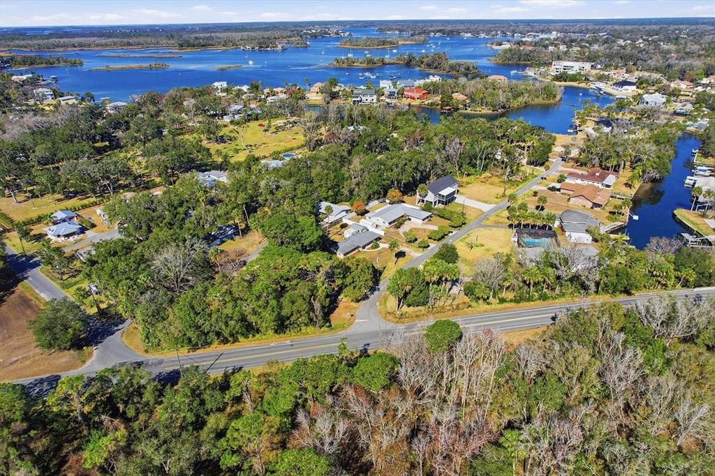 1050 North Midiron Point Crystal River, FL 34429 - Photo 45 of 57 an aerial view of residential houses with outdoor space and trees