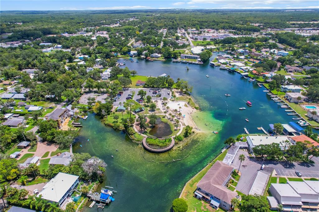 1050 North Midiron Point Crystal River, FL 34429 - Photo 55 of 57 an aerial view of residential house with outdoor space and lake view