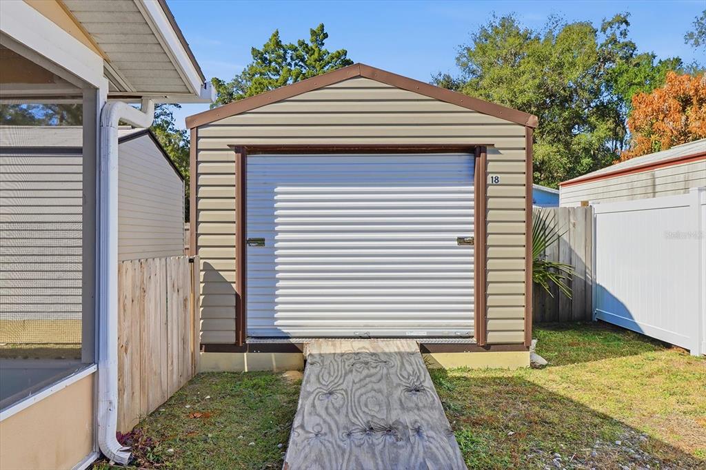 1050 North Midiron Point Crystal River, FL 34429 - Photo 8 of 57 a front view of a house with garden