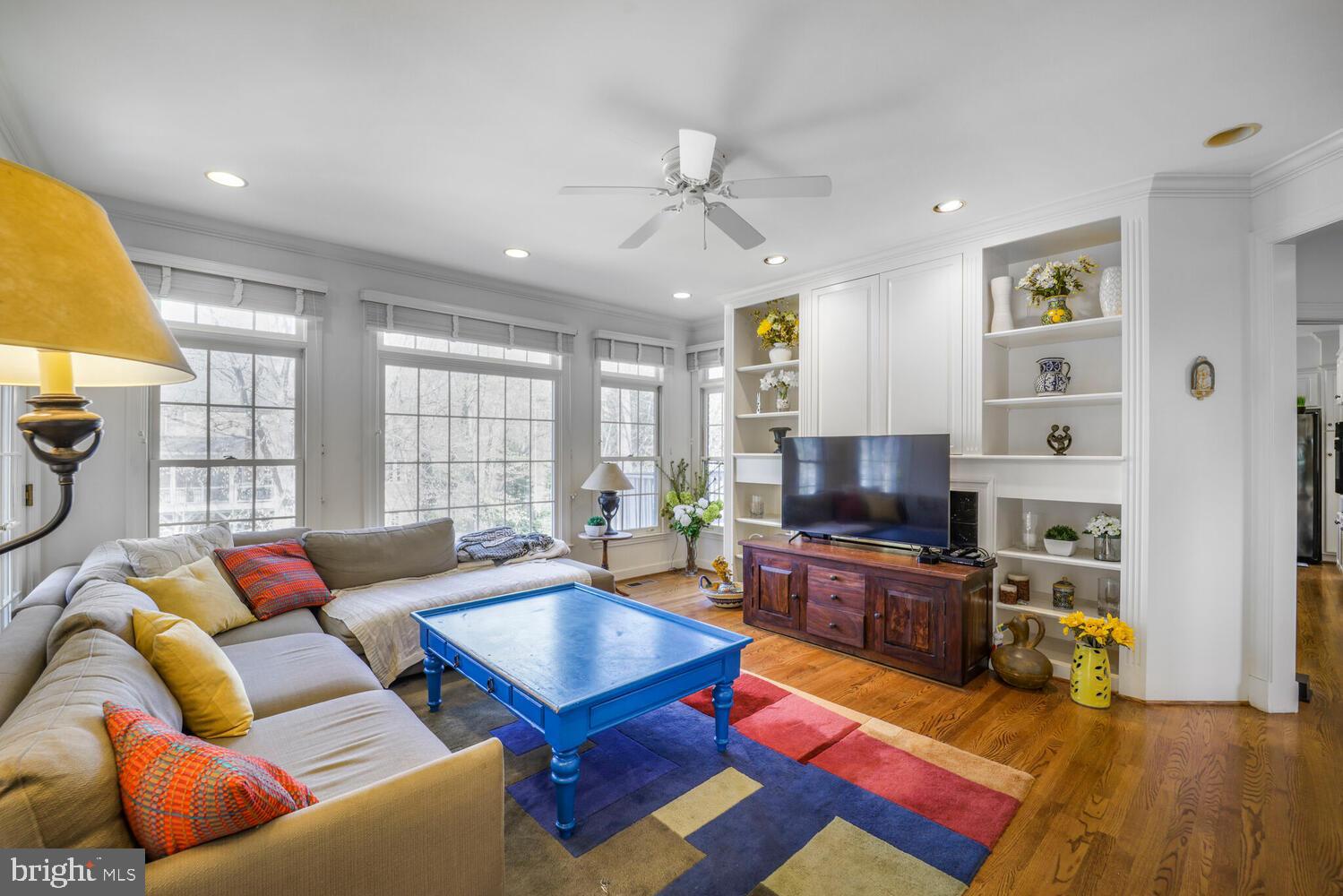5119 Warren Place Northwest Washington, DC 20016 - Photo 12 of 37 a living room with furniture and a flat screen tv