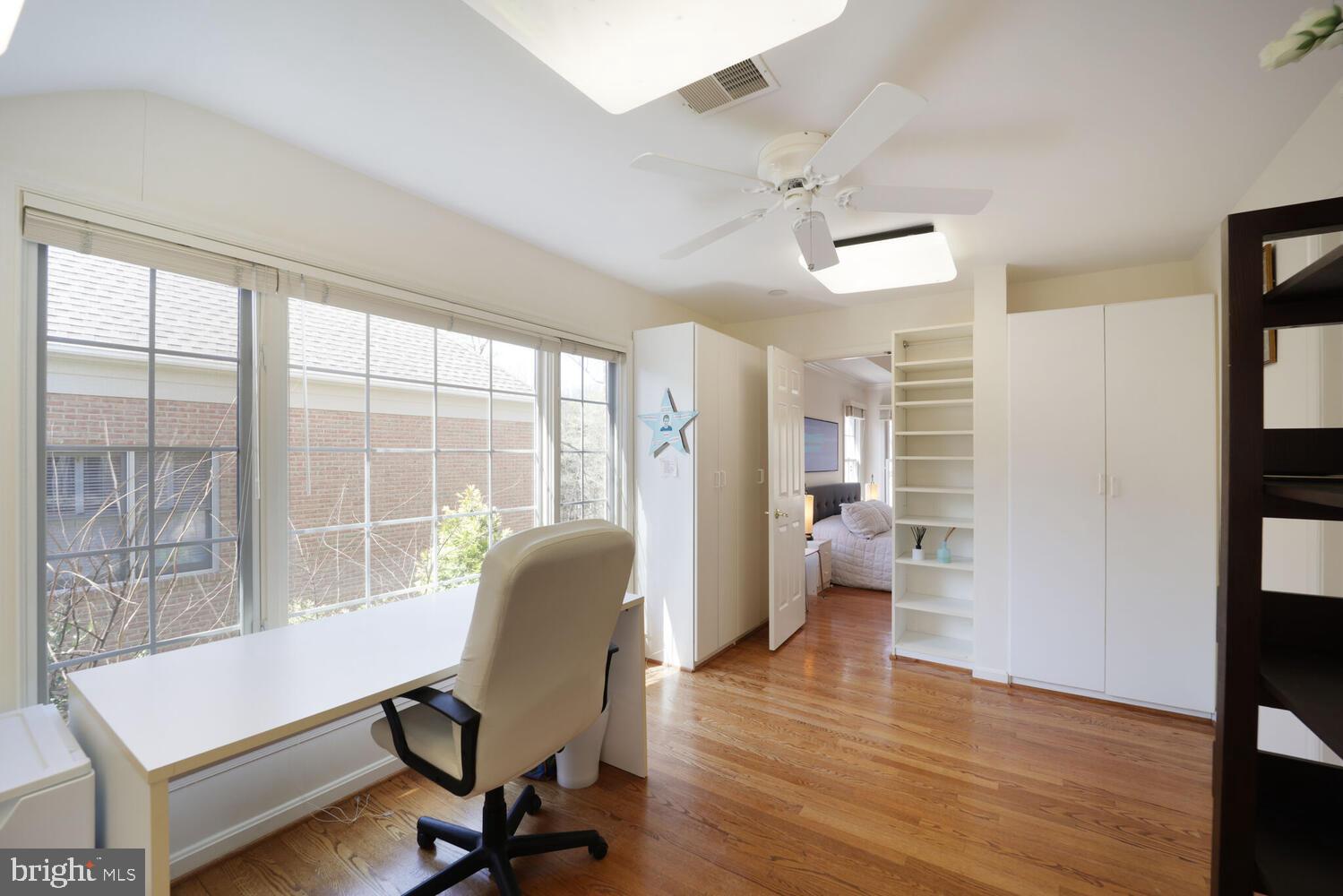 5119 Warren Place Northwest Washington, DC 20016 - Photo 23 of 37 a view of a livingroom with workspace and a window