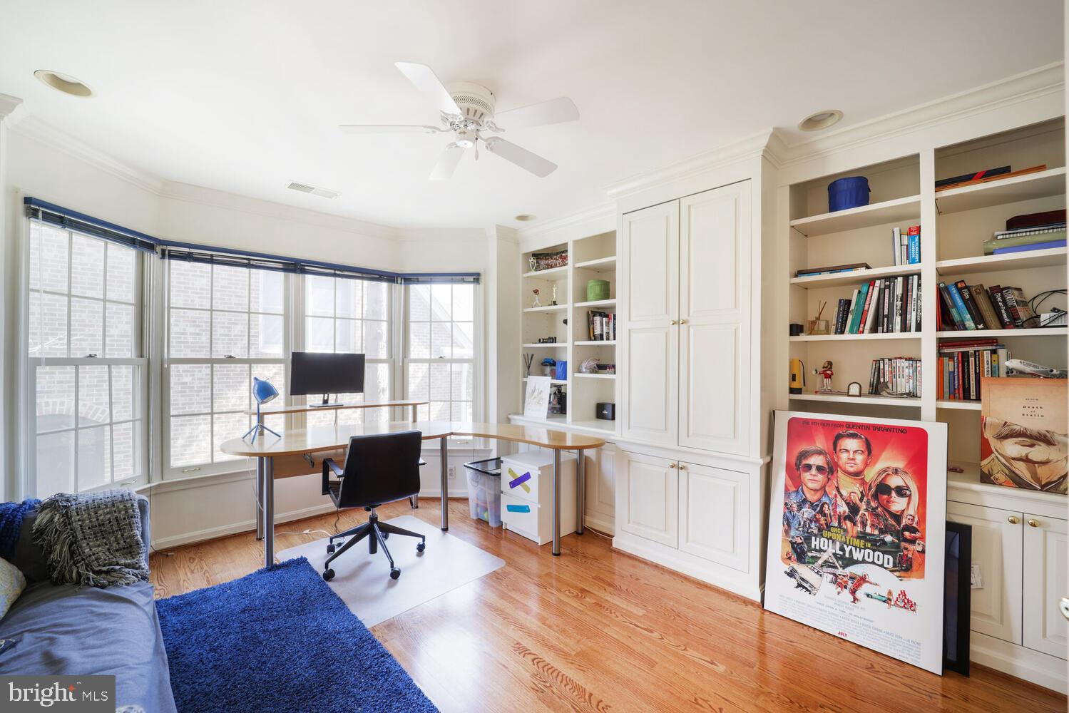 5119 Warren Place Northwest Washington, DC 20016 - Photo 28 of 37 a workspace with furniture window and wooden floor