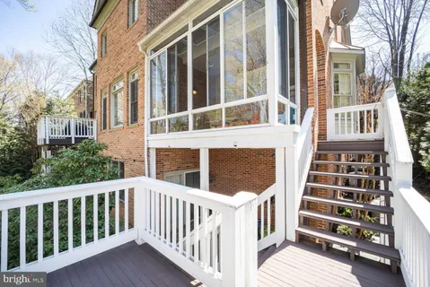 a view of a brick building from a balcony