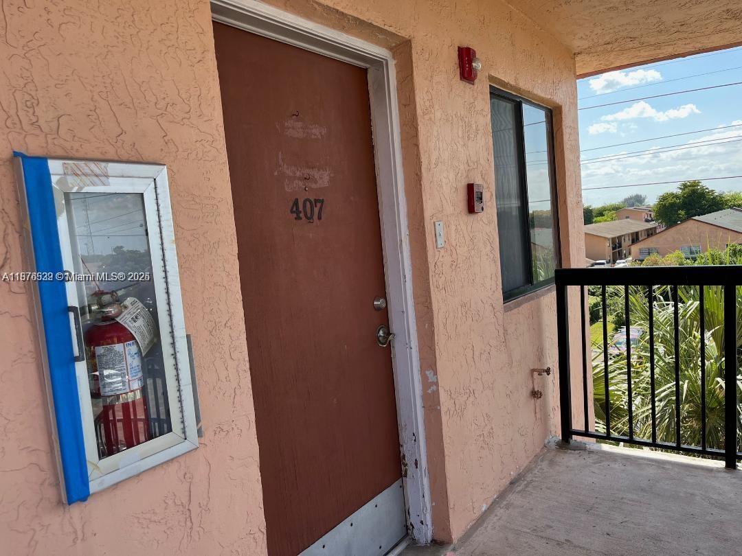5350 West 21st Court, Unit 407 Hialeah, FL 33016 - Photo 3 of 15 a view of a front door